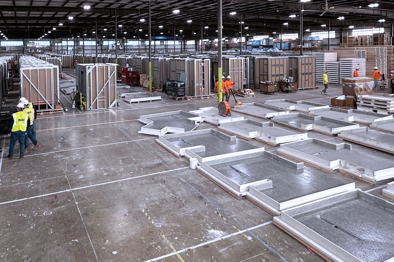 prefabrication manufacturerer, warehouse view of components laid out ready for assembly