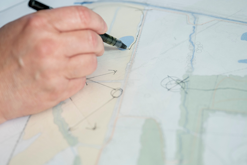 Landscape architect sketching a master plan